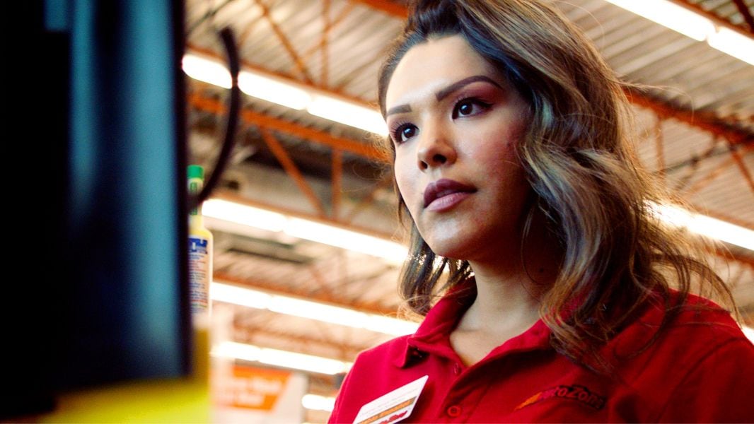 AutoZone employee reviewing Fix Finder report