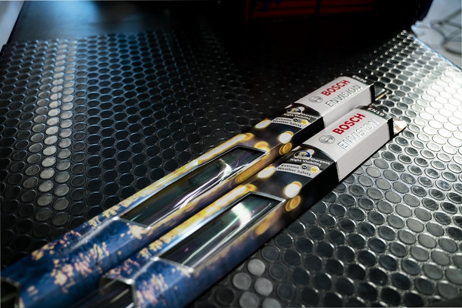 Bosch Envision wiper blades sitting on top of a parts counter.