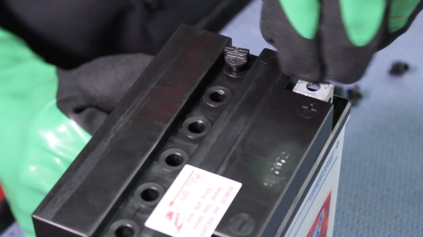 Safe installation of cell caps on Duralast Powersport motorcycle battery from AutoZone