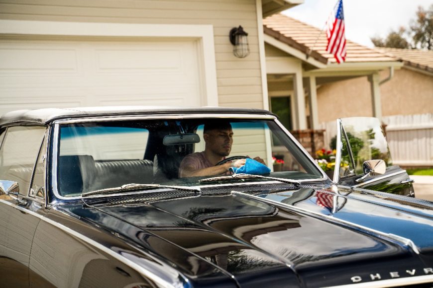 Person polishing the interior of their newly finished project car