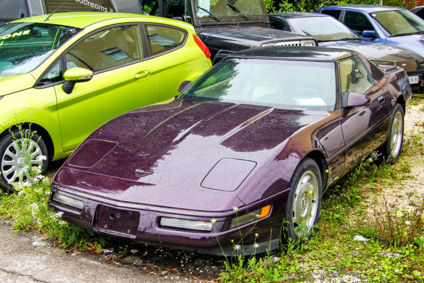 Rebuilt Corvette in a salvage yard