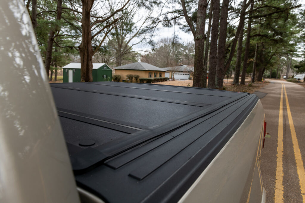 How do I fix/seal/repair my cracked tonneau cover vinyl? I live in a  powerful sun and dry environmental. My tonneau cover has developed bad  cracking at the folds. What is the best