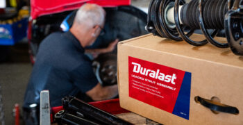 mechinc installing duralast shocks and struts 5