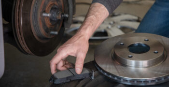 duralast rotor and pad on tire off of car no boxes