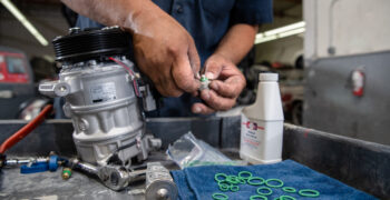 mechanic prepping ac kit 2