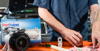 mechanic prepping ac kit 5